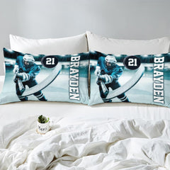 Side angle view of athletic winter sports bedding showing vibrant teal and petroleum navy tones on mattress