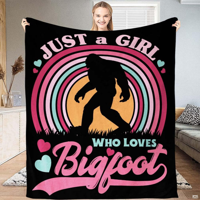Pastel rainbow arch framing Bigfoot silhouette with hearts and typography on black, view 1.