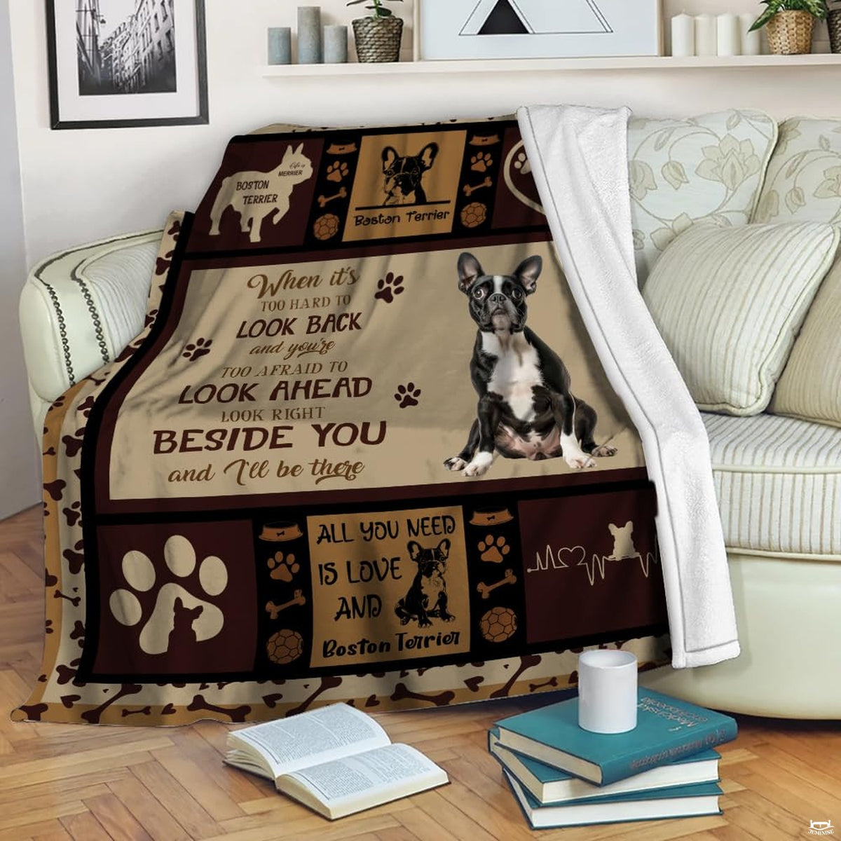 Close view of thematic accent thematic accent dog illustrations and heart motifs on brown bedding.