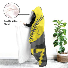 Close up of camo softball throw blanket highlighting yellow softball seams and urban camo print