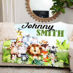 Detailed view of sweet baby elephant and giraffe illustrations on tropical jungle throw blanket