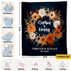 Close up of autumn floral wreath throw blanket displaying deep navy background and botanical textures