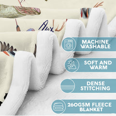 Close-up perspective of the detailed outdoor wildlife animal illustrations on a throw blanket