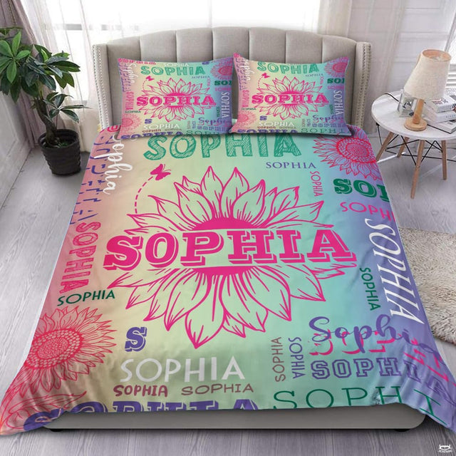 Raspberry pink and emerald unicorn floral bedding set displayed neatly on a bed in a vibrant bedroom