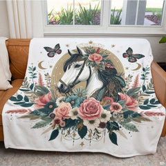 Angle perspective of decorative floral horse bedding emphasizing the delicate equine portrait and wreath.