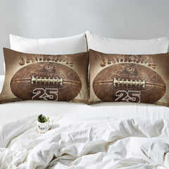 Matching pillow sham detail for rustic football bedding set displaying vintage ball graphics on wood