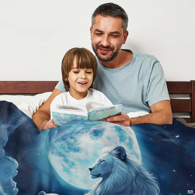 Woman holding open white lion and cub moonlight throw blanket in modern living room