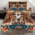 Boho western cow skull and feathers Aztec bedding set displayed neatly on a bed in a rustic bedroom