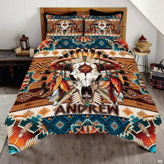 Boho western cow skull and feathers Aztec bedding set displayed neatly on a bed in a rustic bedroom