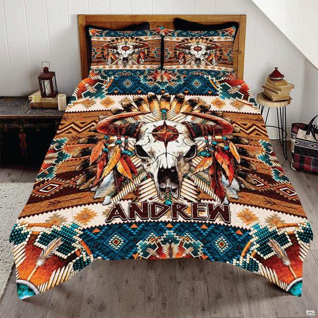 Boho western cow skull and feathers Aztec bedding set displayed neatly on a bed in a rustic bedroom