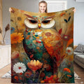 Bohemian art nouveau owl surrounded by blooming daisies and wildflowers on a throw blanket
