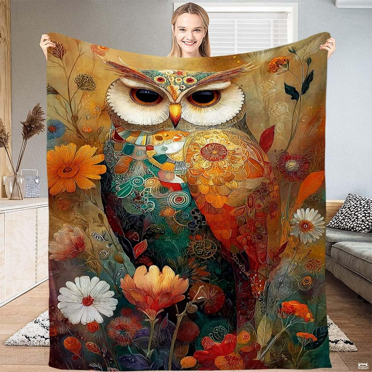 Bohemian art nouveau owl surrounded by blooming daisies and wildflowers on a throw blanket