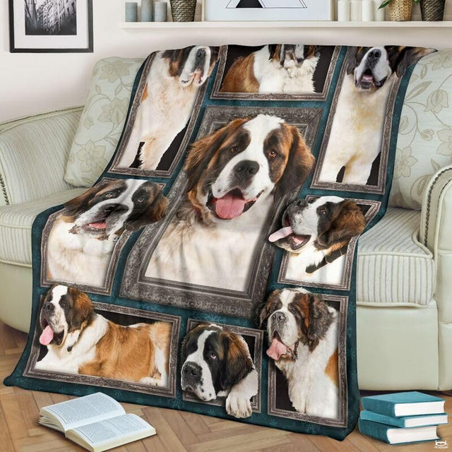 Saint Bernard throw blanket styled across a living room sofa near stacked books and a cup.