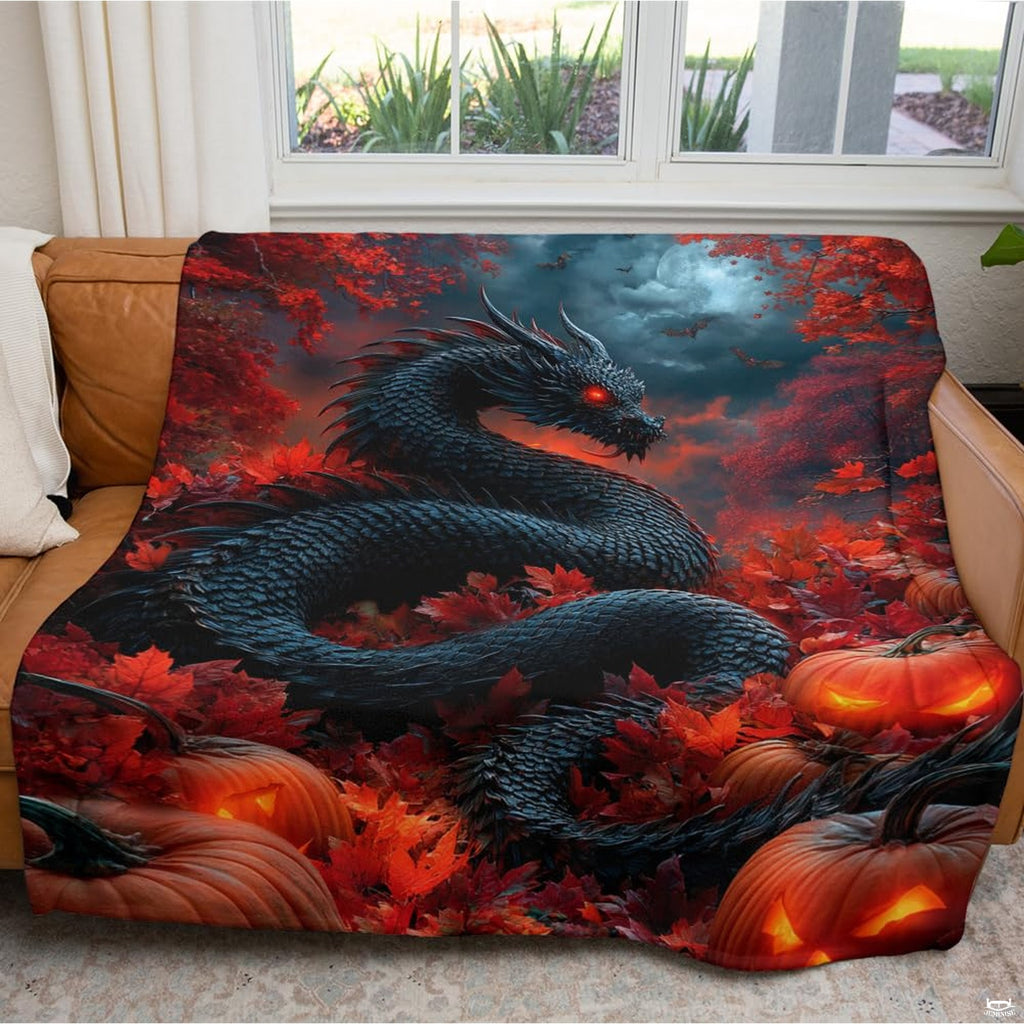 Spooky living room decor setting featuring dragon and pumpkins throw blanket