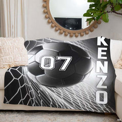 Soccer goal net textile arranged over sofa with circular mirror
