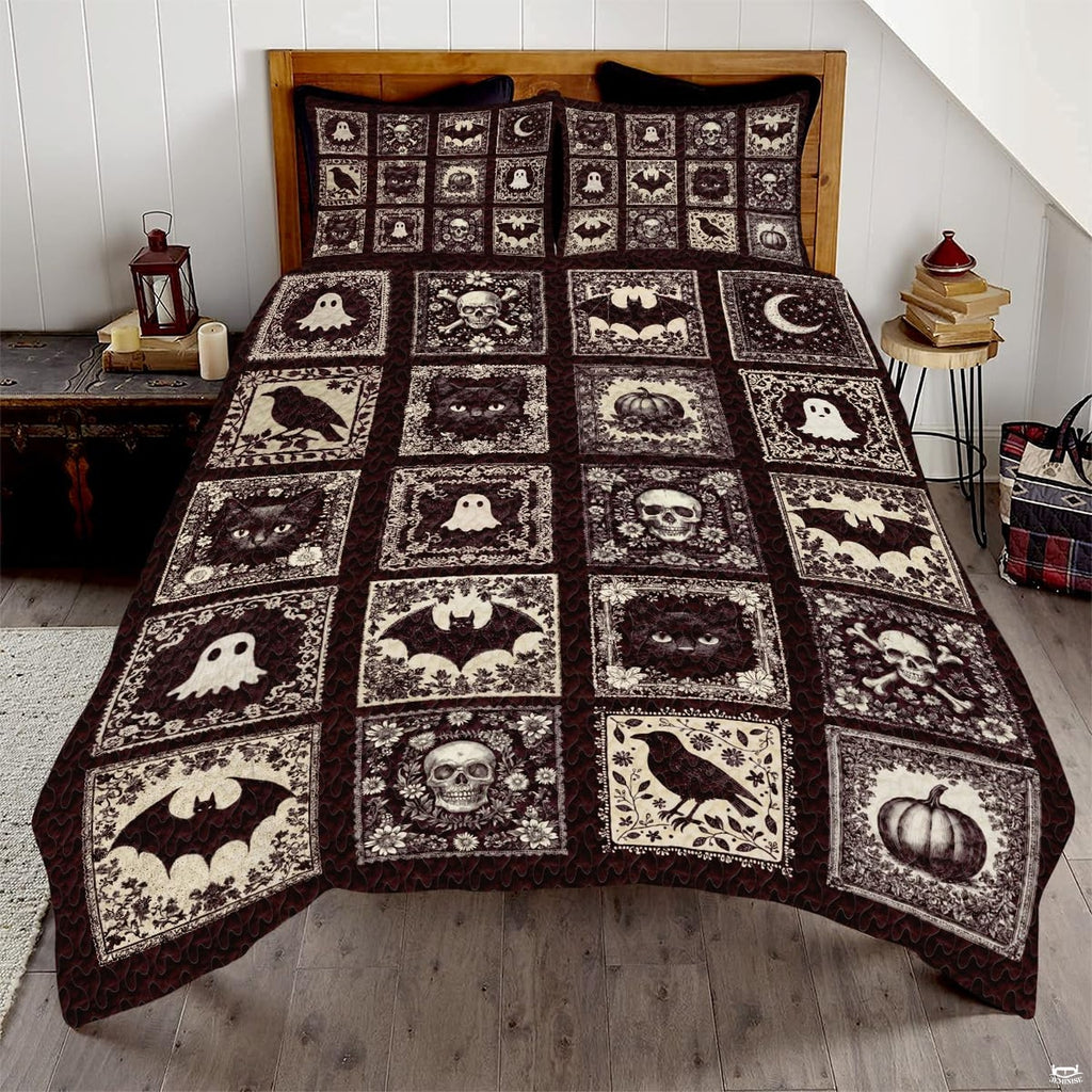 Gothic halloween bedding featuring patchwork panels with skulls, ravens, bats, and ghosts in dark espresso cream tones.