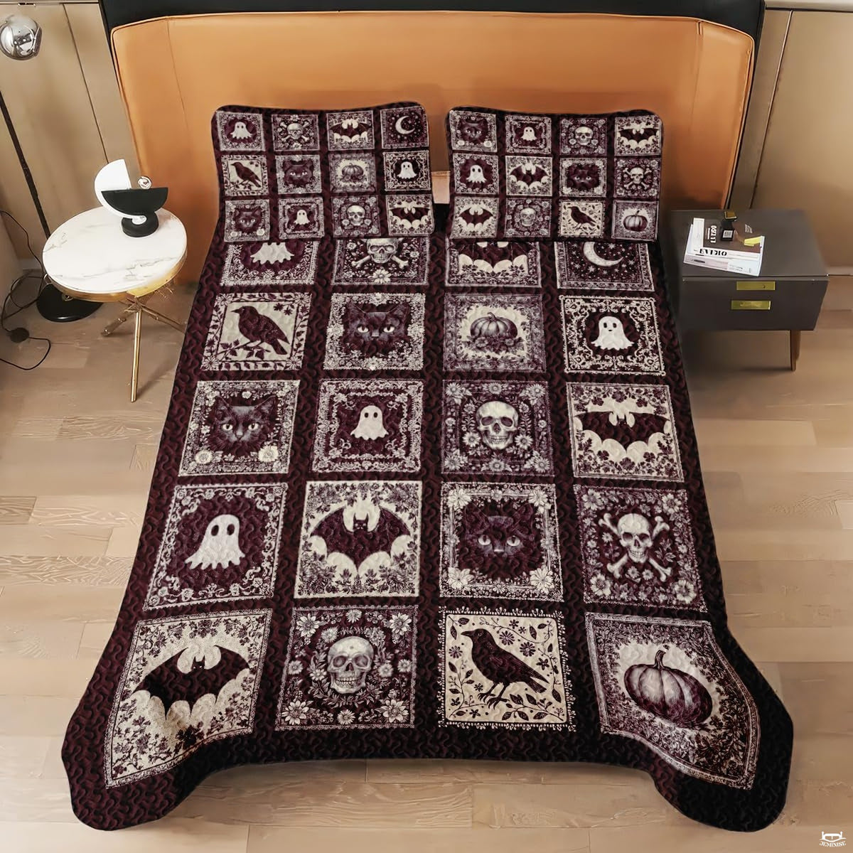 Close-up perspective of gothic halloween bedding with intricate monochrome vintage border patterns and flying bats.