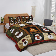 Overhead perspective of winter bedding arranged neatly across a holiday guest room mattress