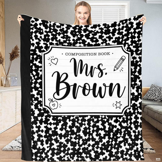 Black white marbled notebook style bedding set showcasing speckle patterns and doodle sketches.