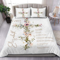 Inspirational Christian cross scripture floral bedding set displayed neatly on a bed in a bright bedroom