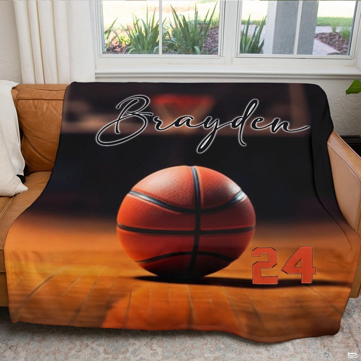 Sports fan entertainment room featuring basketball court throw blanket on sofa