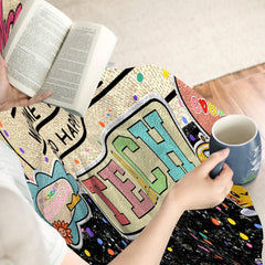 Side angle of school bus bedding set highlighting decorative confetti speckles.