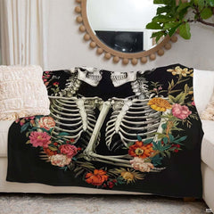Gothic floral skeleton throw blanket view 4 highlighting skeleton couple, vibrant peonies, and black background