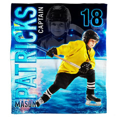 Youth ice hockey player throw blanket held open showing dramatic arena lighting and skater graphic