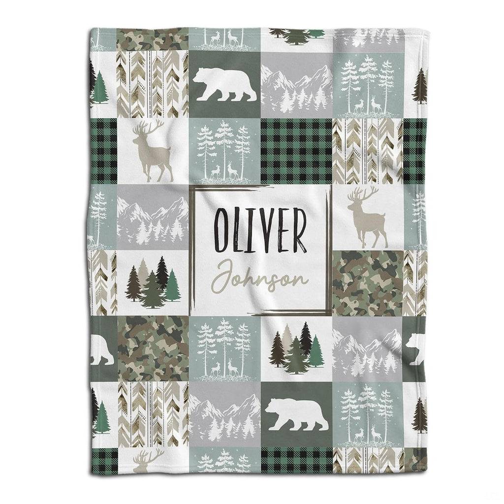 Woodland patchwork visual motif with evergreen pines, deer, bears, and rustic plaid squares in sage and taupe.