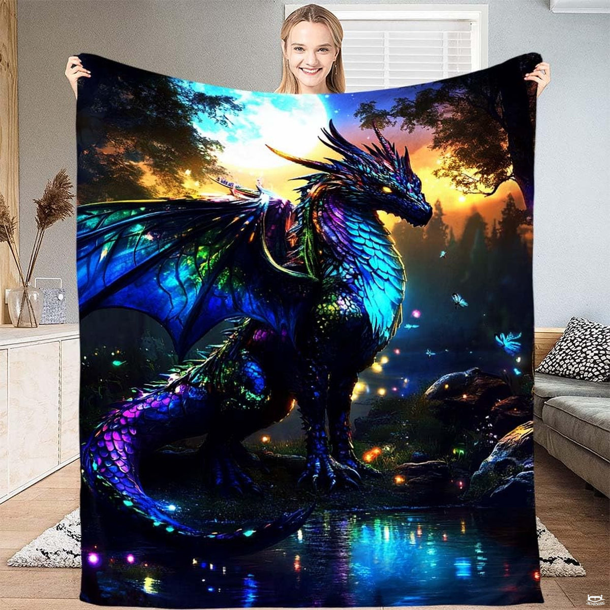 Close-up view of iridescent dragon throw blanket highlighting shimmering scales and radiant cyan wing details.
