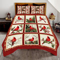 Vintage red cardinal and pine botanical bedding set featuring songbirds and evergreen branches in rustic patchwork tiles.
