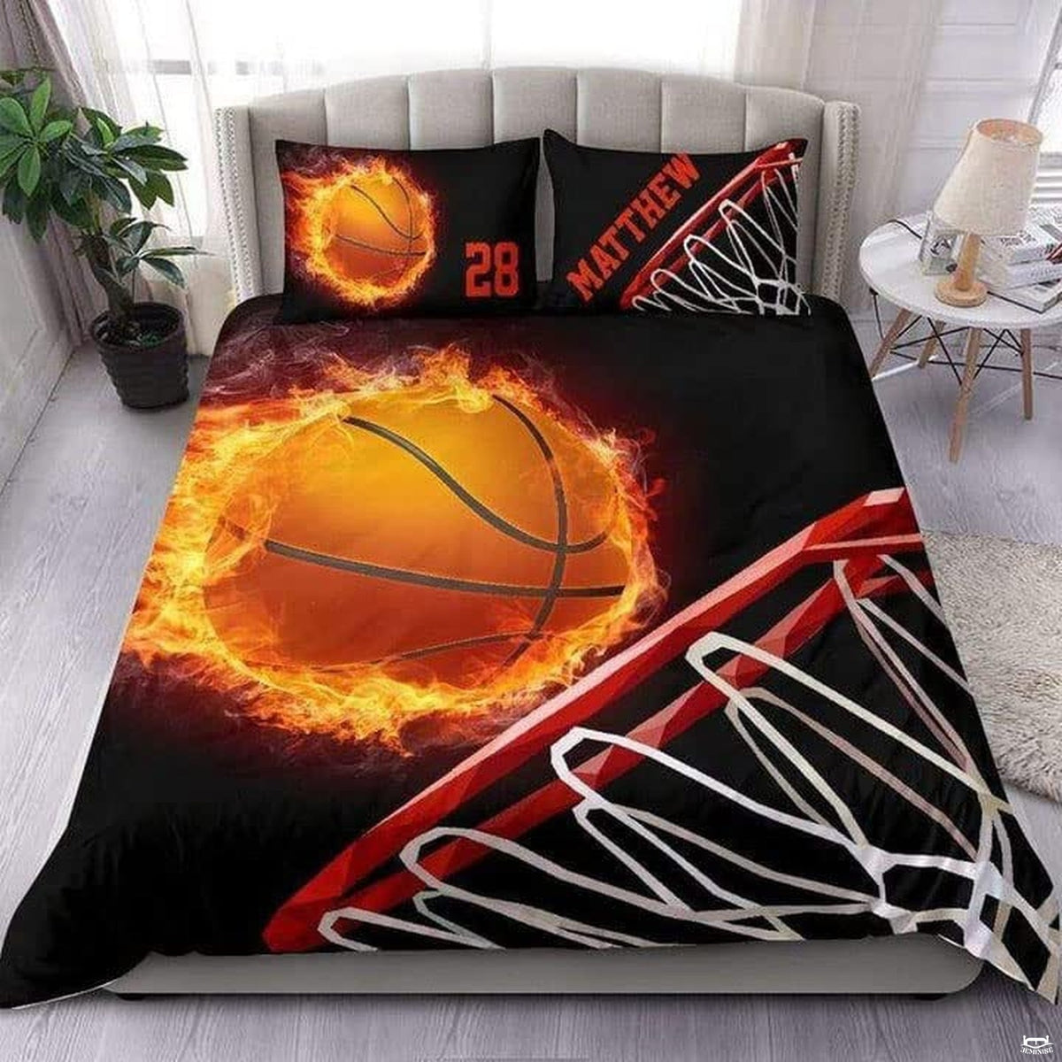 Close-up perspective of sports bedding detailing glowing yellow flames, ball ribbing, and net graphic lines