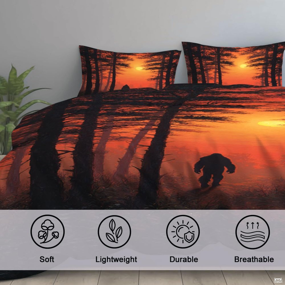 High-angle view of bigfoot graphic bedding showing rich tangerine, coral, and mahogany tones across bed.