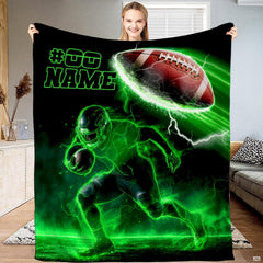 Neon green football throw blanket view 2 highlighting laser outline player, electric lightning, and glowing gridiron