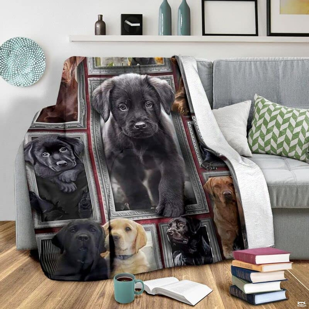 Close up view of antique silver frames and adorable black Labrador puppy portrait detail.