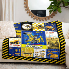 Overhead perspective of kids excavator bedding artwork surrounded by black and yellow borders.