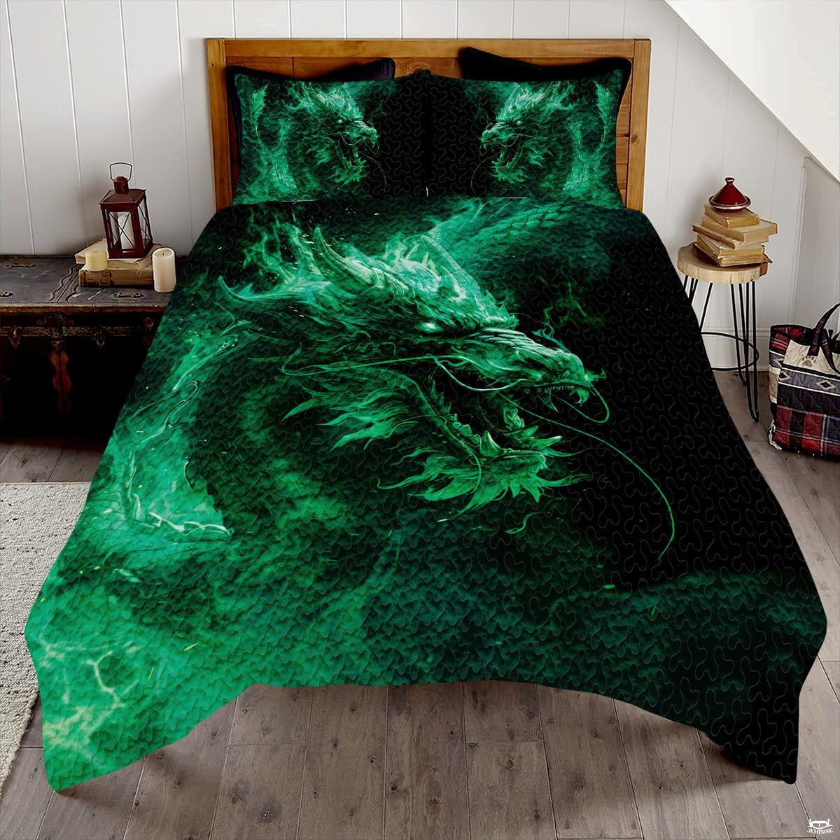 Glowing emerald dragon with long whiskers displayed across a black bed and pillows
