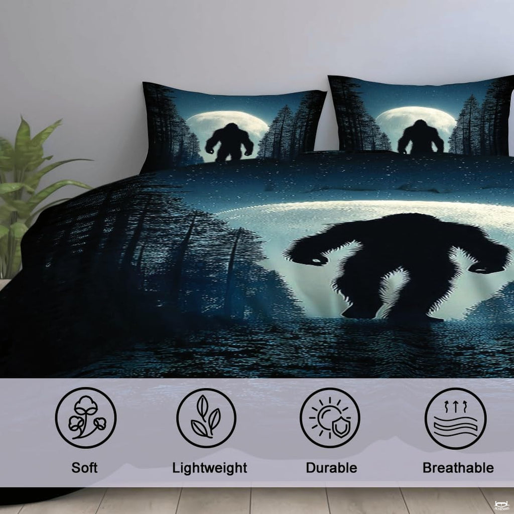 High-angle view of bigfoot graphic bedding showing rich midnight navy, slate, and sage tones across bed.