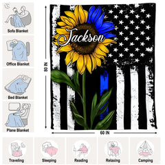 Sunflower Thin Blue Line blanket styled across contemporary bed