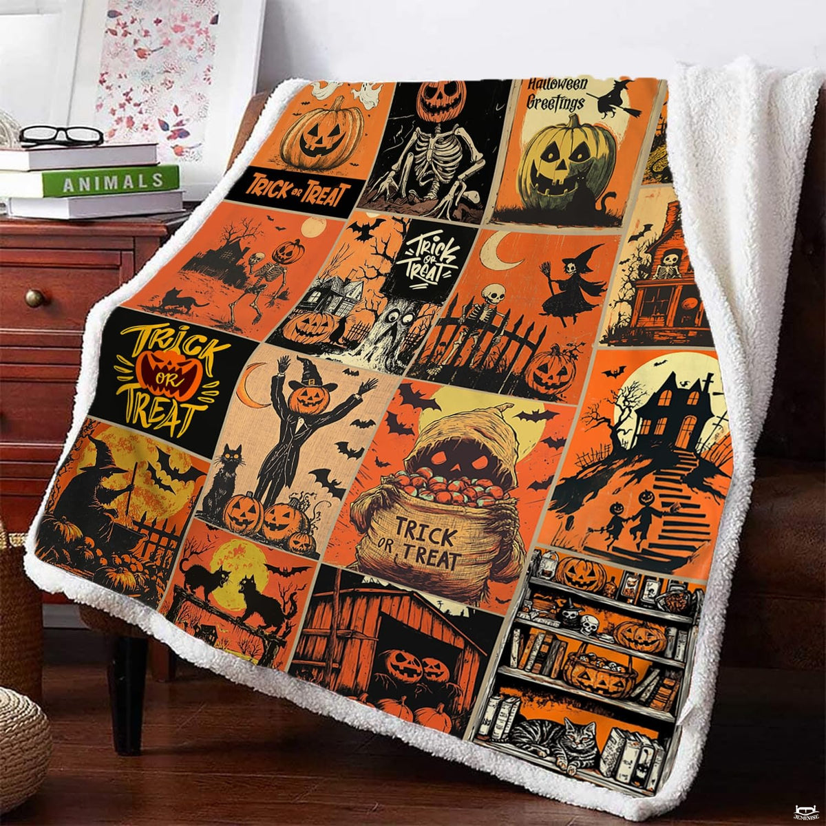 Living room sofa displaying the vintage spooky comic panel throw blanket draped across furniture.