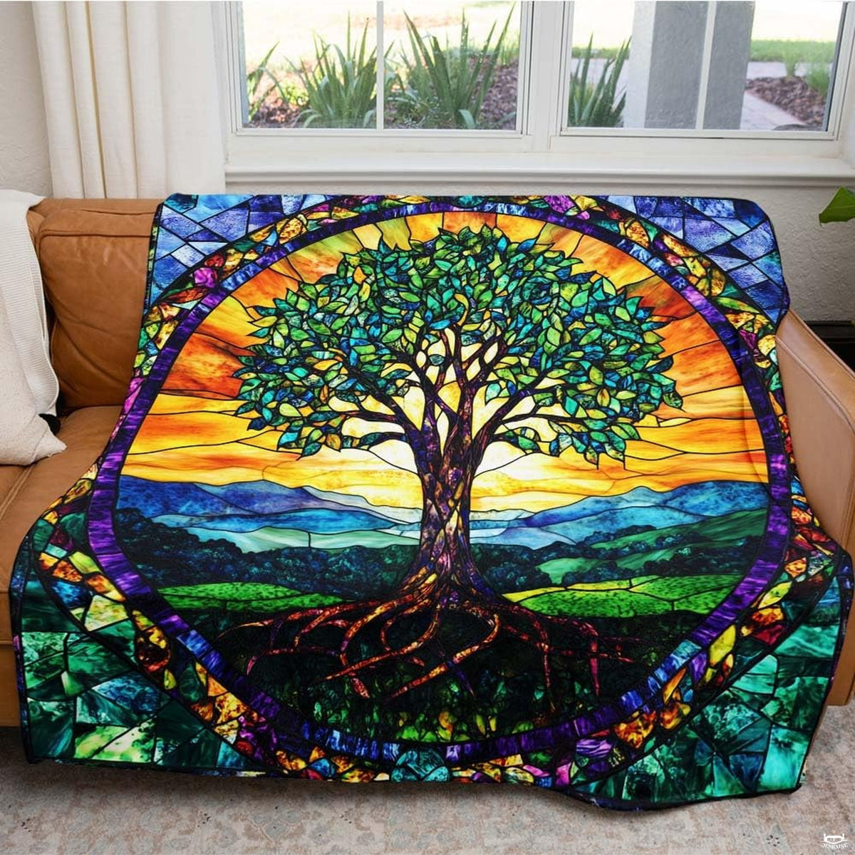 Folded throw blanket presentation highlighting cobalt blue, violet, and green mosaic tiles.