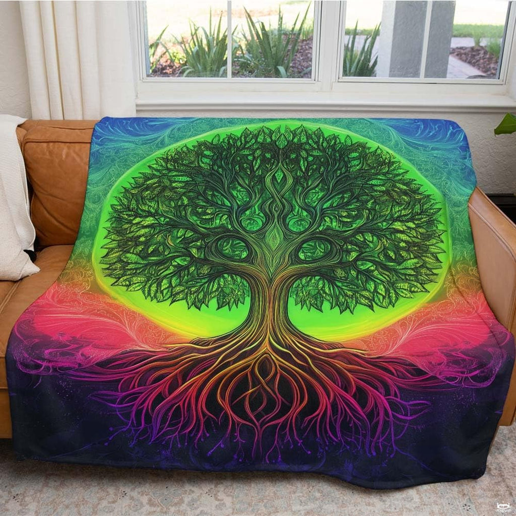 Atmospheric bohemian lounge setting showing psychedelic green tree throw blanket draped on couch