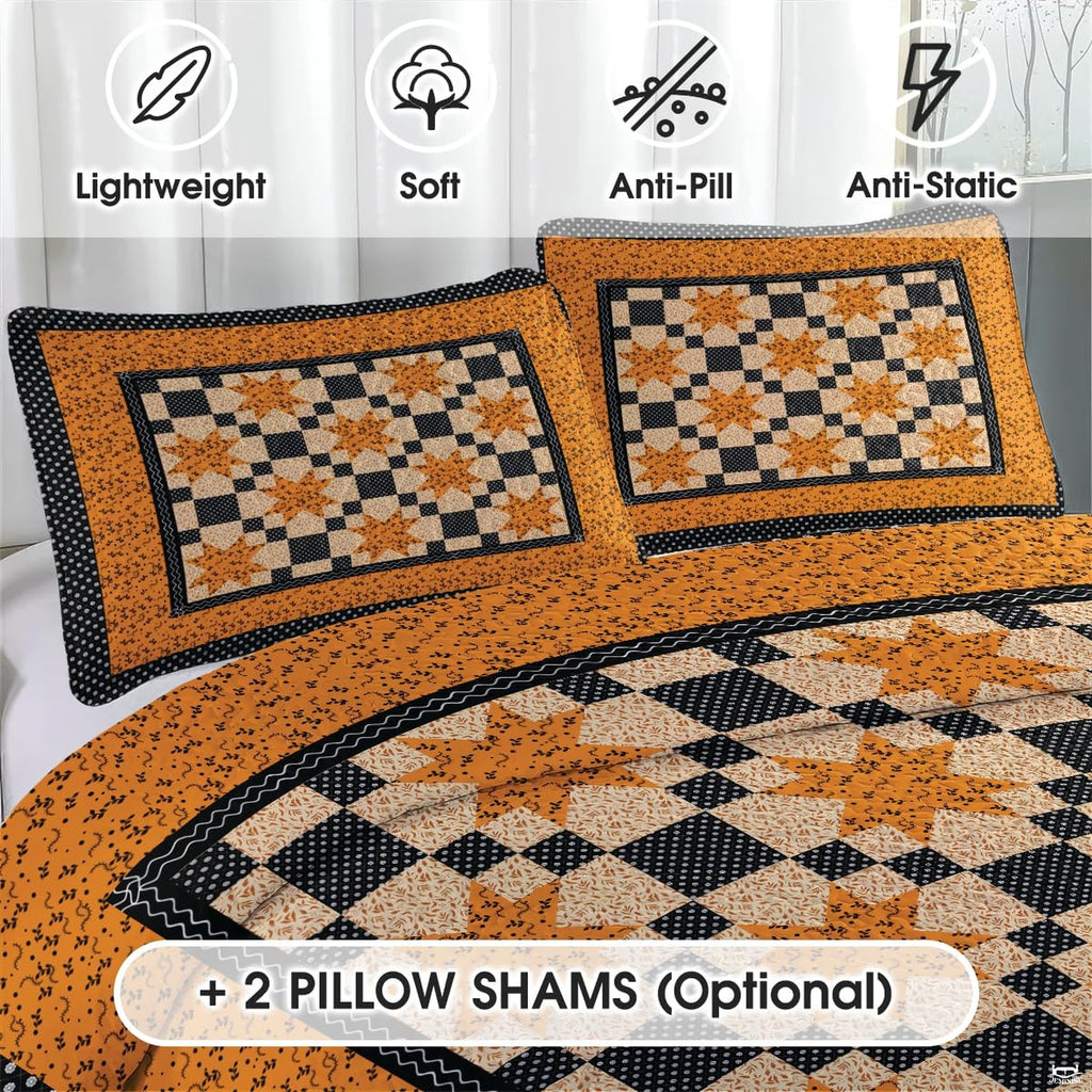 Matching pillow sham detail for star patchwork bedding set displaying geometric blocks in bedroom setting
