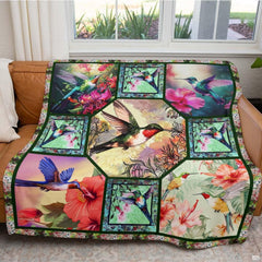 Bedroom styling highlighting tropical hummingbird bedding against serene ambient decor and garden accents.