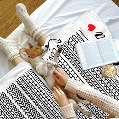 Laundering graphic showing gentle washing recommendations for printed couple throw blanket