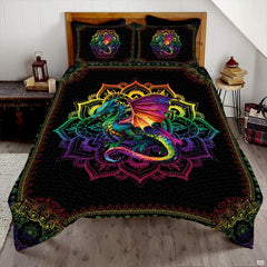 Rainbow dragon and mandala artwork displayed across a black bed covering and matching shams