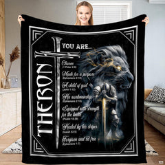 Woman holding up spiritual armor lion and kneeling knight blanket
