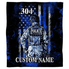 thematic accent officer in tactical gear against distressed blue line flag print for bedding decor.