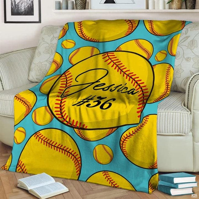 Softball graphic decor display featuring bright yellow balls over a turquoise background.