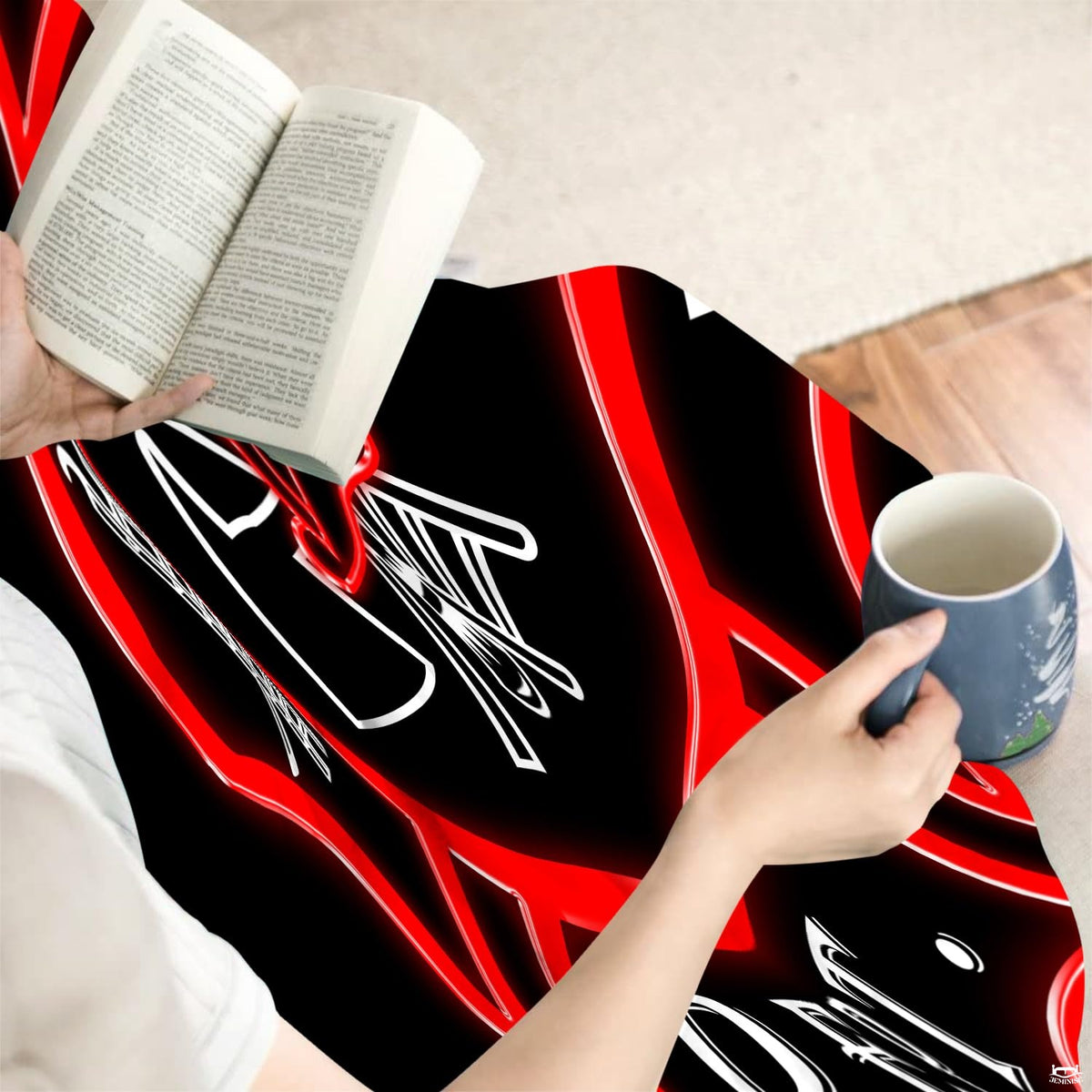 Overhead flat view of the first responder firefighter throw blanket displaying high-contrast graphic badge